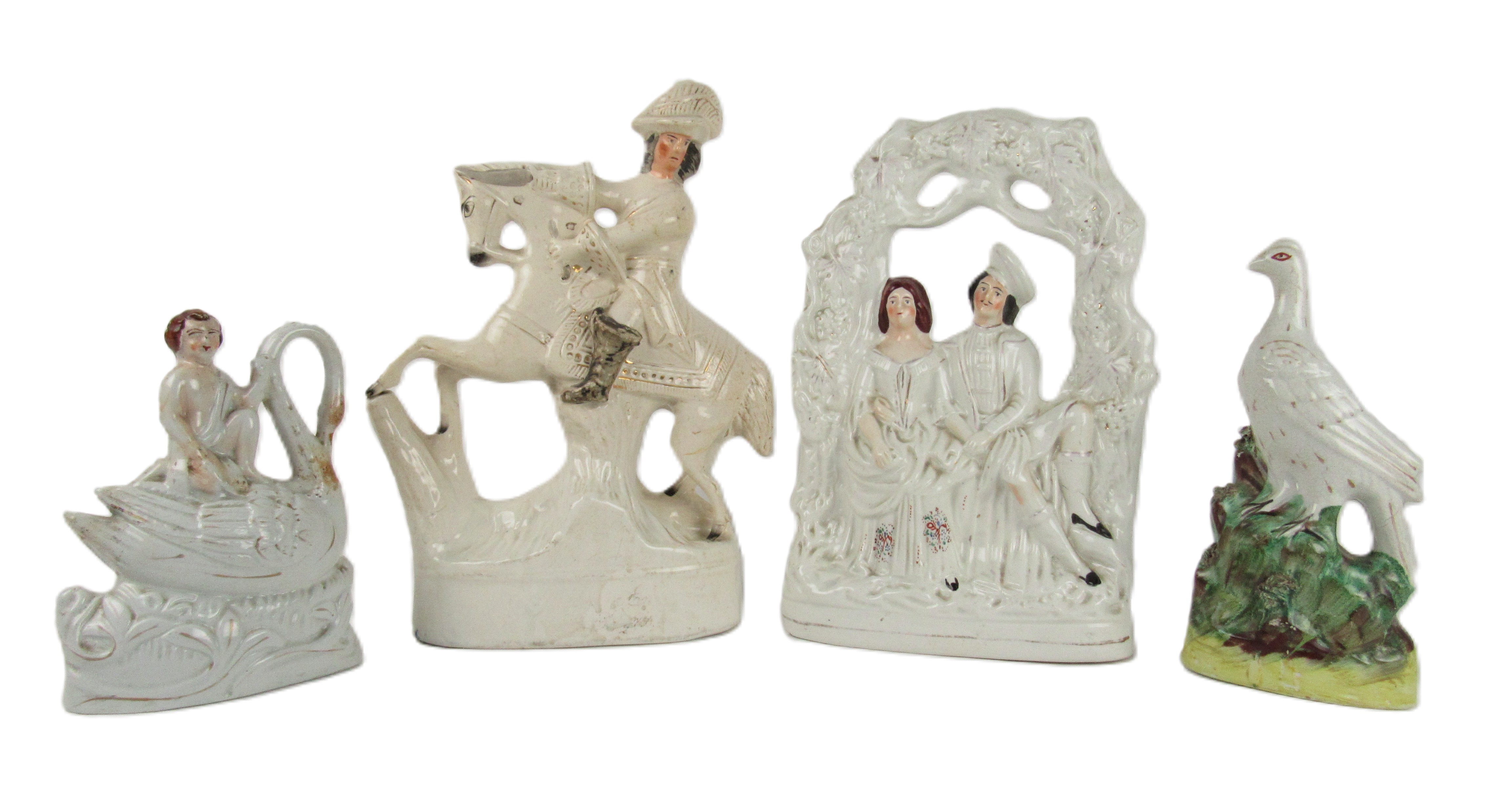 A Staffordshire Figure of "Dick Turpin Esq.," on horseback, a similar ditto "A Courting Couple,"