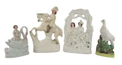 A Staffordshire Figure of "Dick Turpin Esq.," on horseback, a similar ditto "A Courting Couple,"