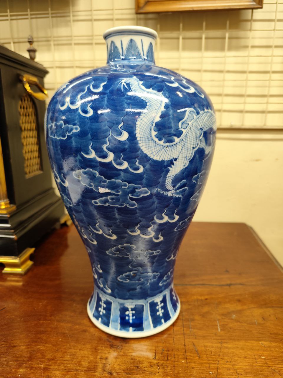 A large Chinese blue and white bulbous shaped 'Dragon Vase,' decorated with floating dragons, - Image 3 of 8