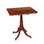 A 19th Century mahogany square flip-top Occasional Table, on turned pillar support on four