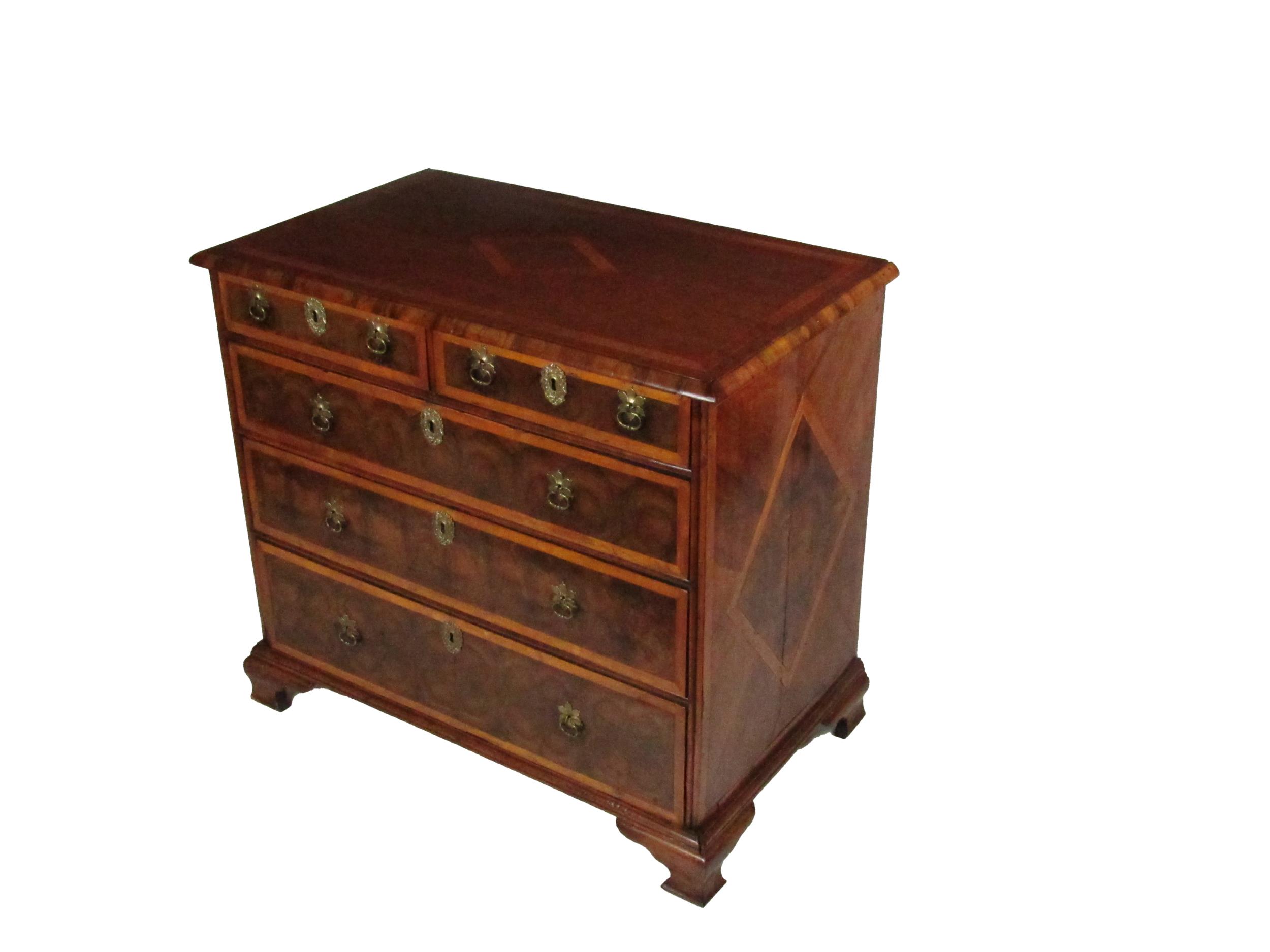 An attractive 18th Century English walnut oyster veneer Chest of Drawers, the moulded top with