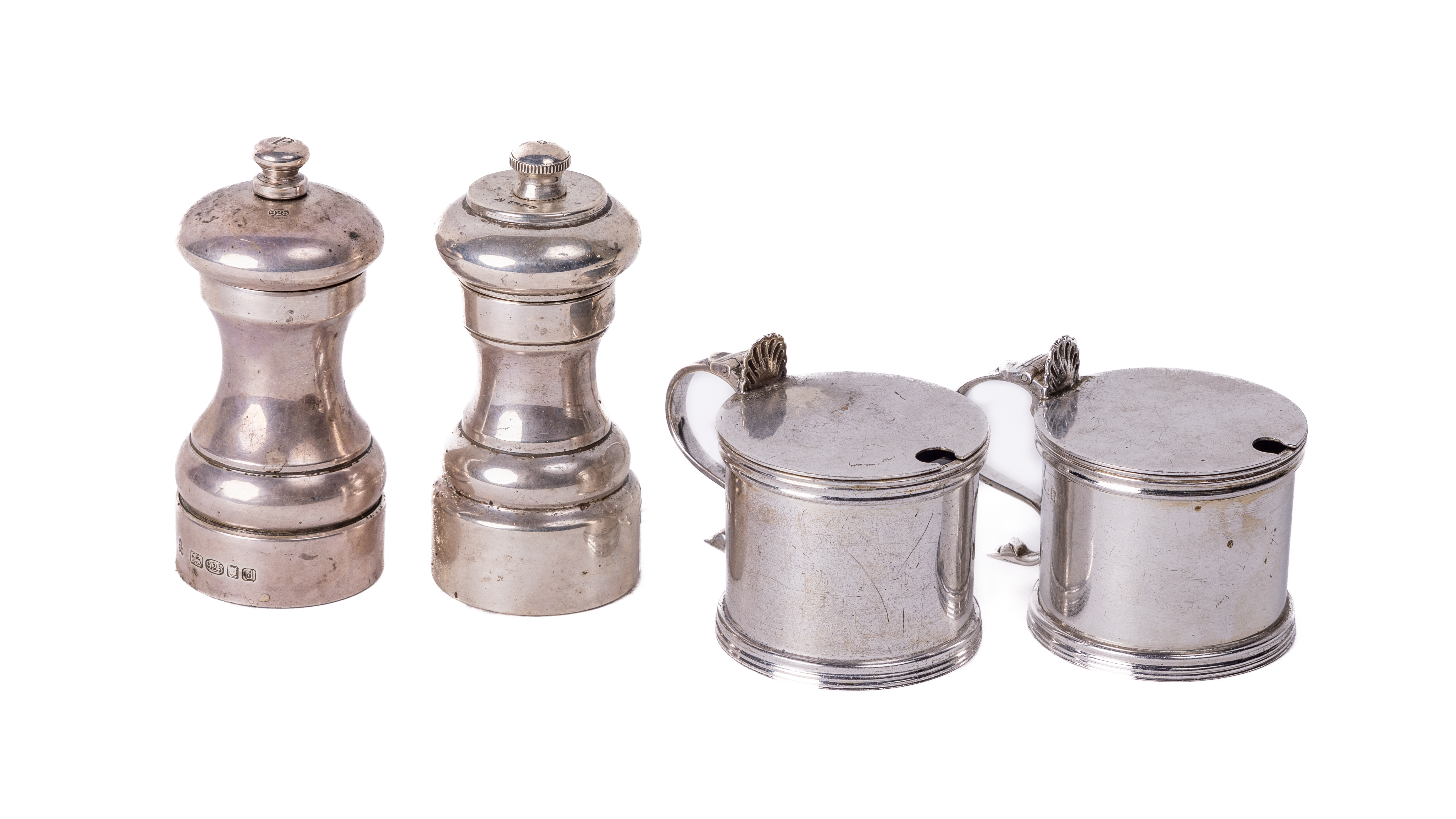A pair of English silver Tankard design Mustard Pots, each with hinged lid (lacks one liner) 'S'