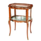 A fine quality French style kingwood Display Cabinet, the shaped top with panelled glass, ormolu