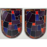 A good pair of arch top leaded and coloured stain glass Panels, 55cms x 38cms (21 1/2'' x 15''). (2)