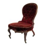 An early Victorian rosewood Nursery Chair, with deep buttoned back, and carved cabriole legs. (1)