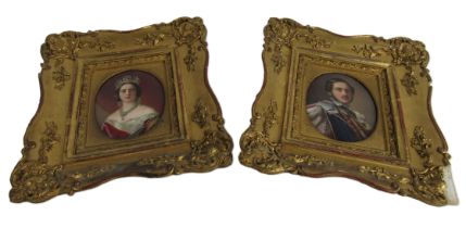 An attractive pair of painted oval miniatures of young Queen Victoria and Albert in regal attire, in