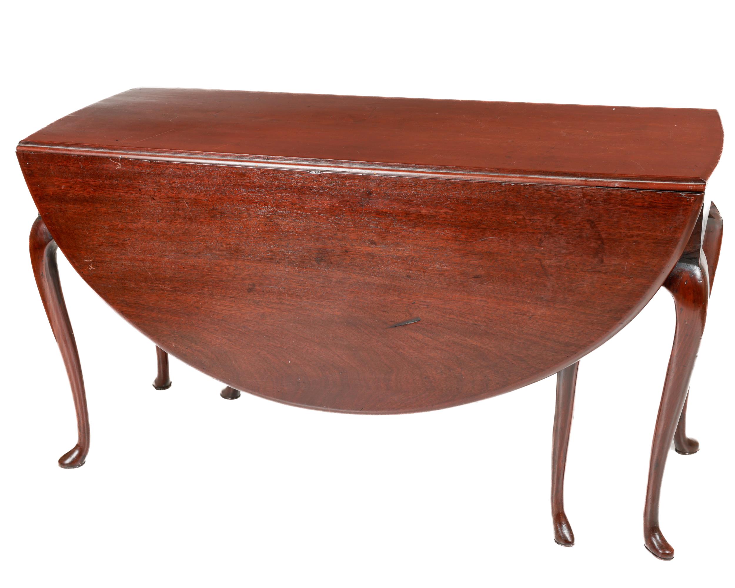 A fine quality and heavy Irish Georgian mahogany drop-leaf Table, with gate leg design, the demi-