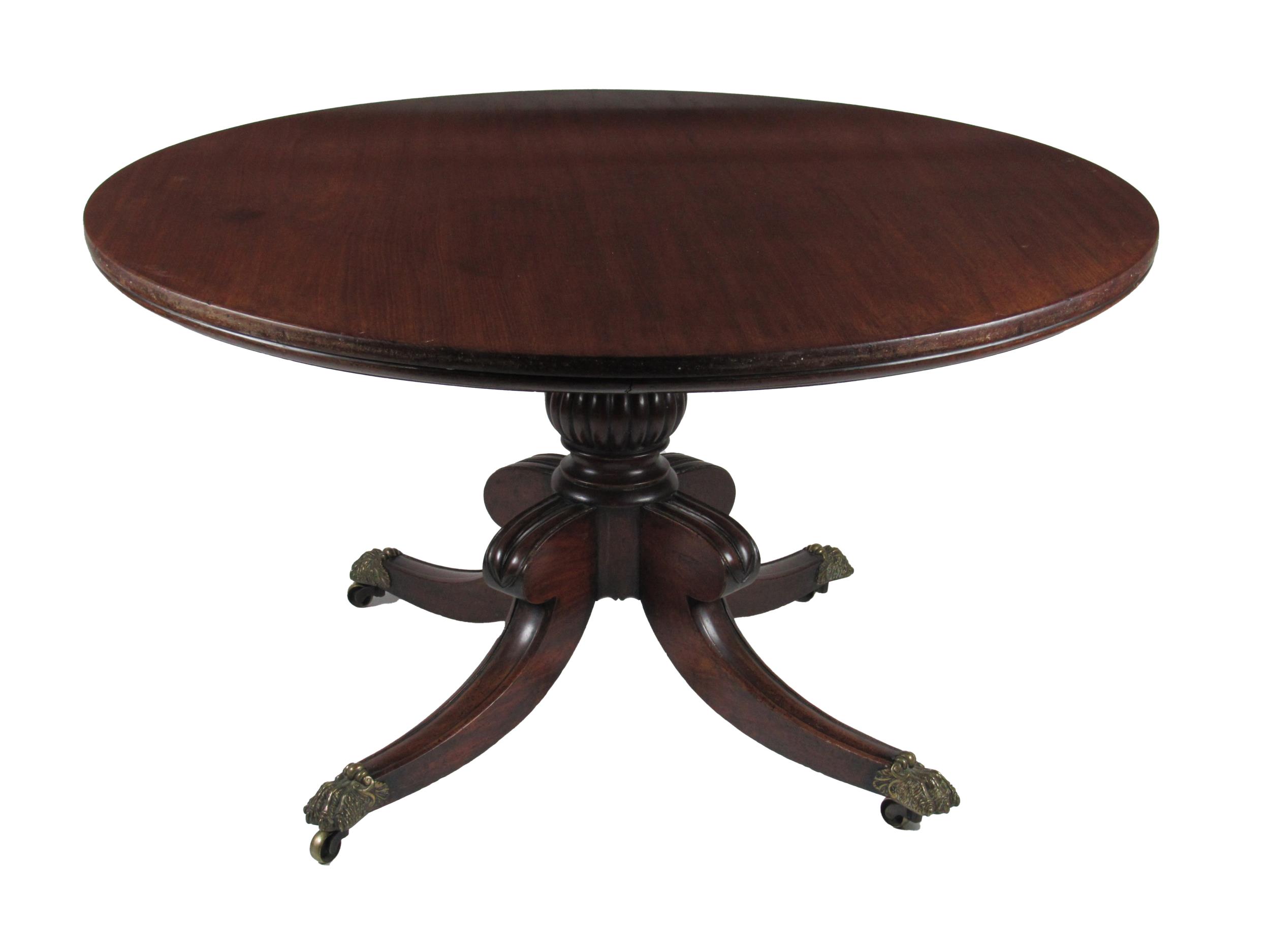 A good quality Regency period mahogany pod Table, with moulded edge, on a carved bulbous pillar,