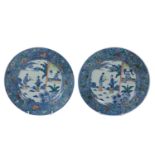 A pair of Chinese Qing period 18th Century Plates, Doucai, decorated with landscape and figures