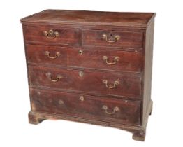 A Georgian Provincial oak Chest of Drawers, with tray top over two short and three long drawers with