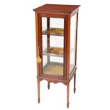 An Edwardian upright and free standing Display Cabinet, the square top with central inlay design