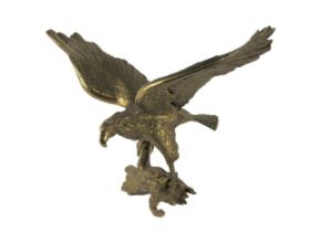 A large gilded bronze Model, of perched eagle with wings out spanned, on a naturalistic branch base,