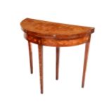A 19th Century demi-lune mahogany Dutch marquetry fold-over Card Table, the top decorated with