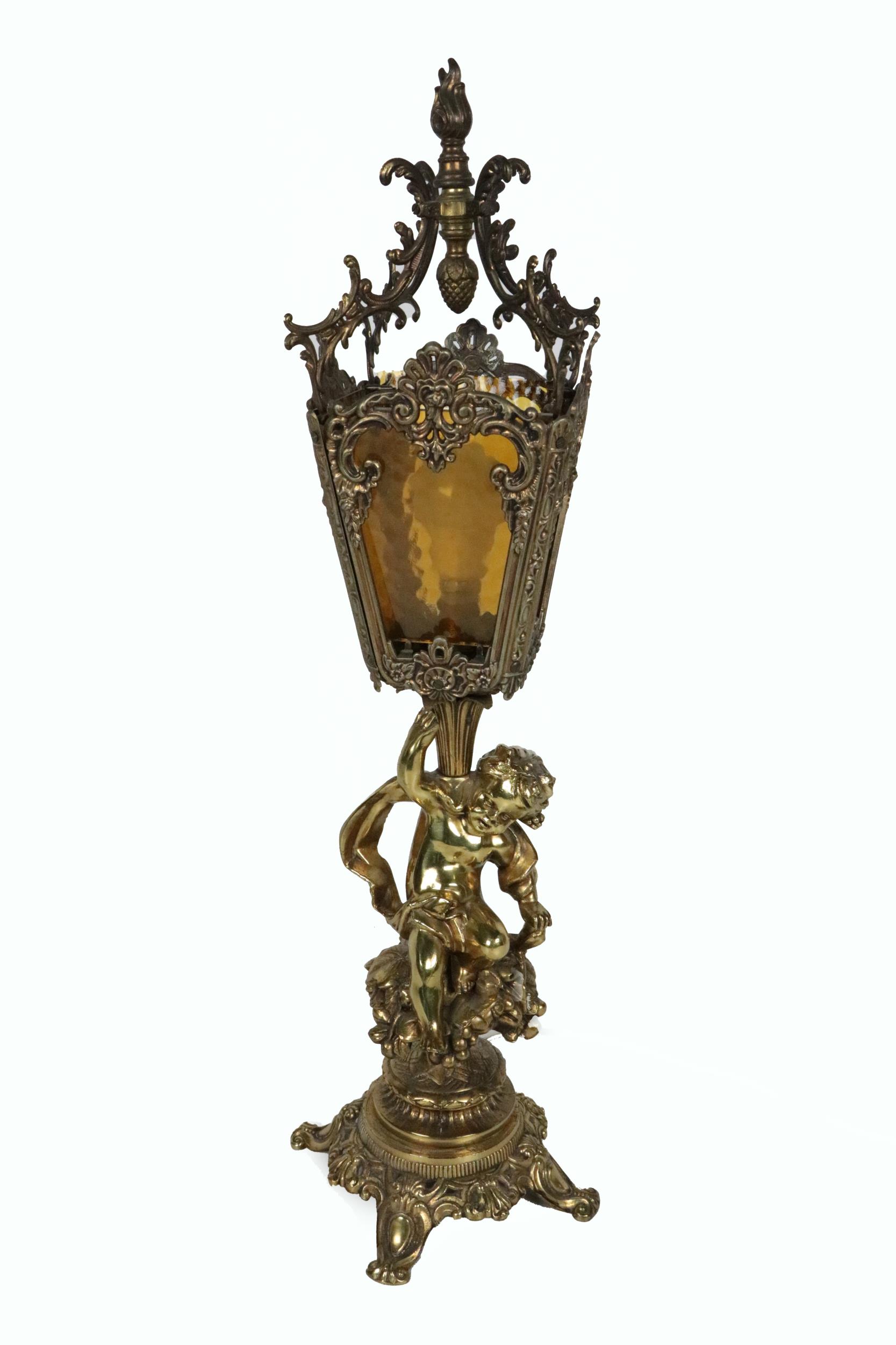 A 19th Century brass Lantern Lamp, with coloured glass and decorative ormolu shade, with cherub
