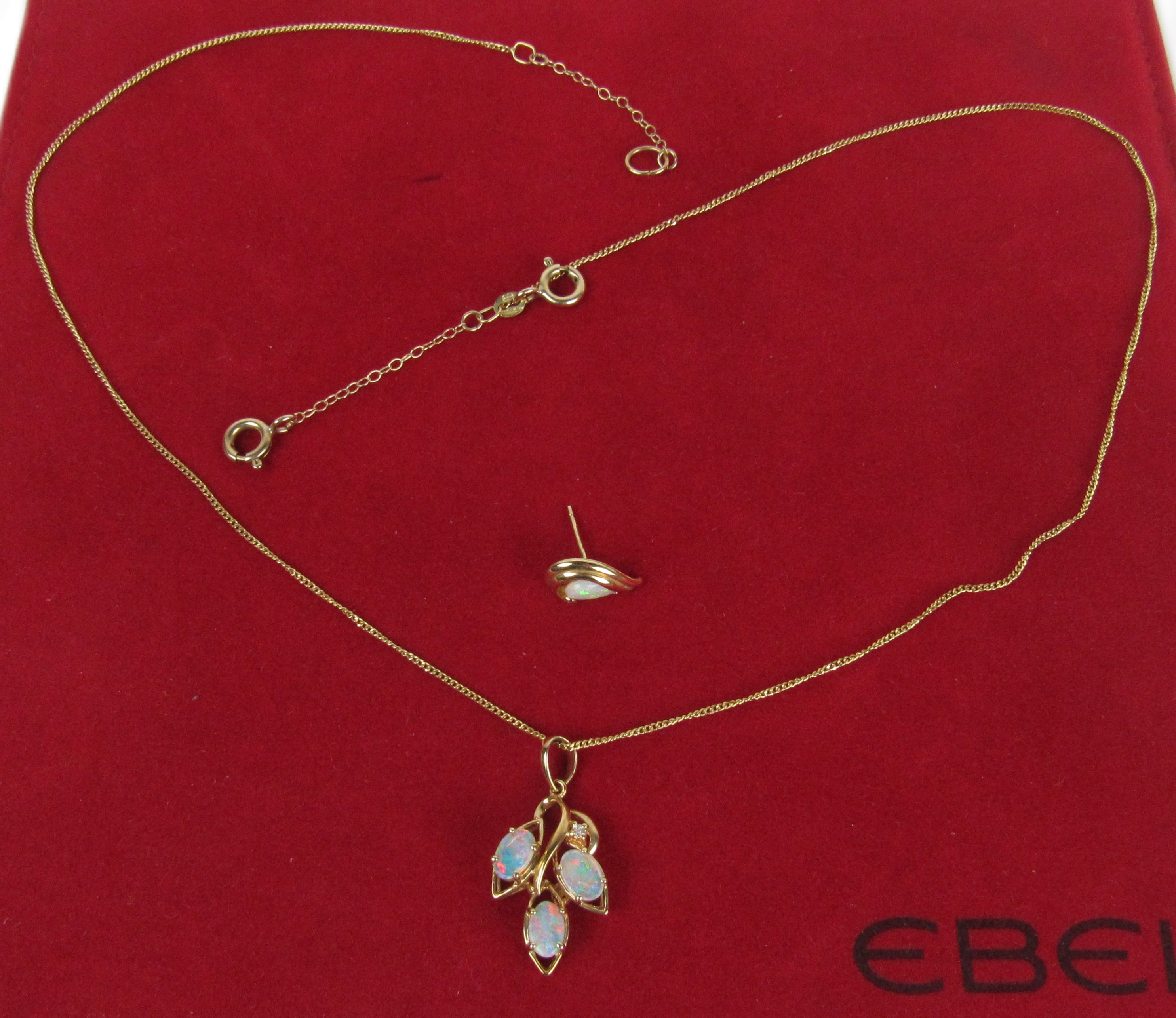 A 9ct gold Ladies Necklace, with pendant set with three opal stones and single small diamond, and - Image 2 of 2