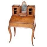 A fine quality Victorian Ladies walnut Bureau du Dame, the top with central shaped mirror, flanked