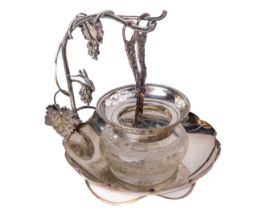 An Edwardian silver plated Grape Bowl, with vine leaf support and decorated grape scissors, together