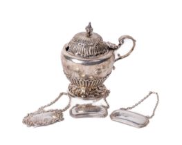 An English silver Mustard, with domed hinge lid and finial, 'S' scroll handle on circular base, mark