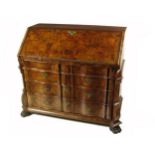 A fine quality 18th Century English bombe shaped Bureau, the slope front with inlaid panels, opening