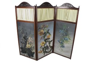 An attractive three part folding Draught Screen, with pierced and arched fretwork capital over cloth