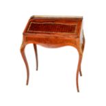 A fine quality Louis XVI style kingswood Bureau, the top with pierced gallery rail above a slope