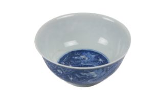 An early Chinese blue and white 'Dragon' Bowl, the interior with medallion design of floating five