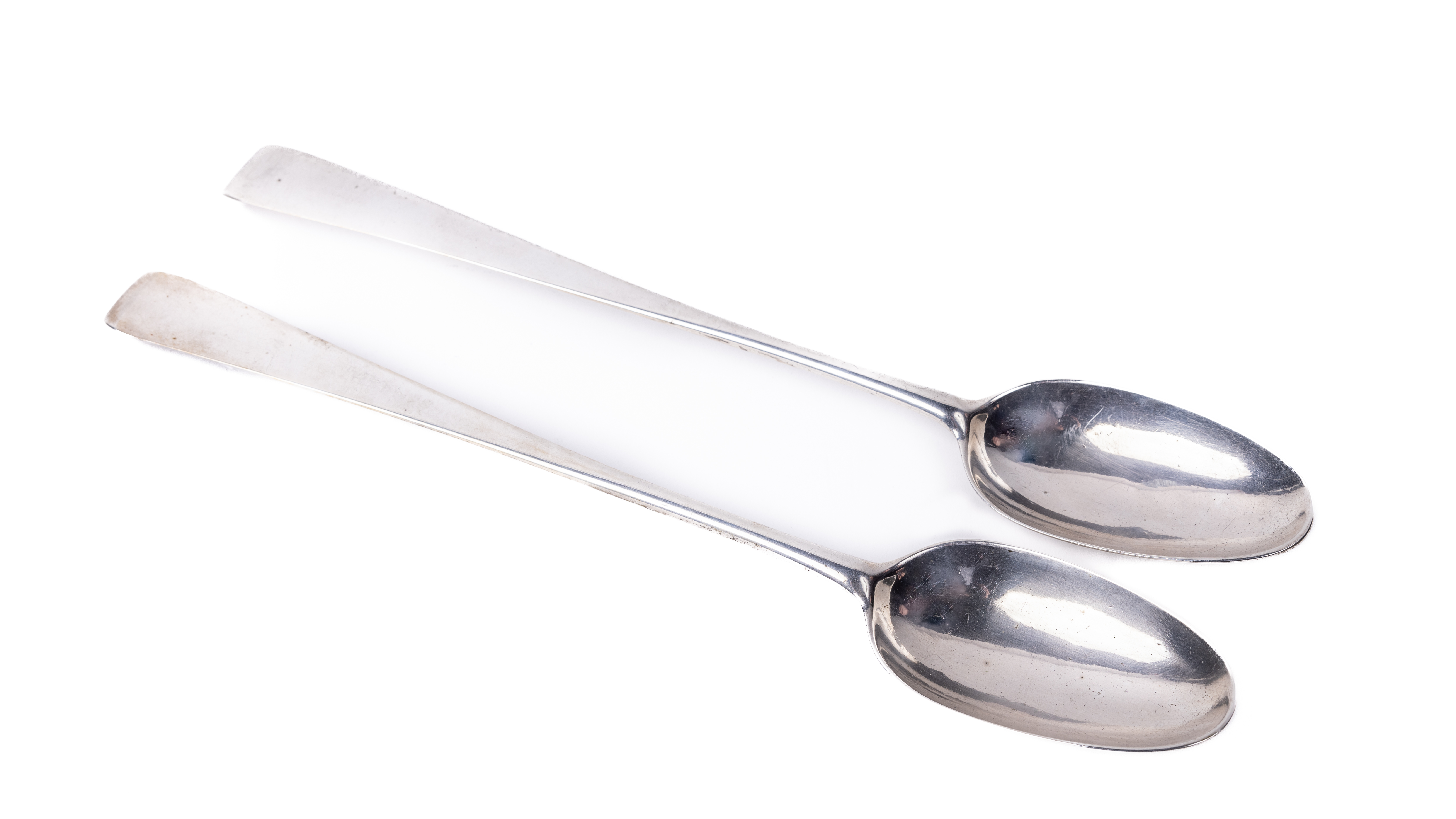 A fine pair of Georgian period Irish Provincial silver hook handle Serving Spoons, by Joseph