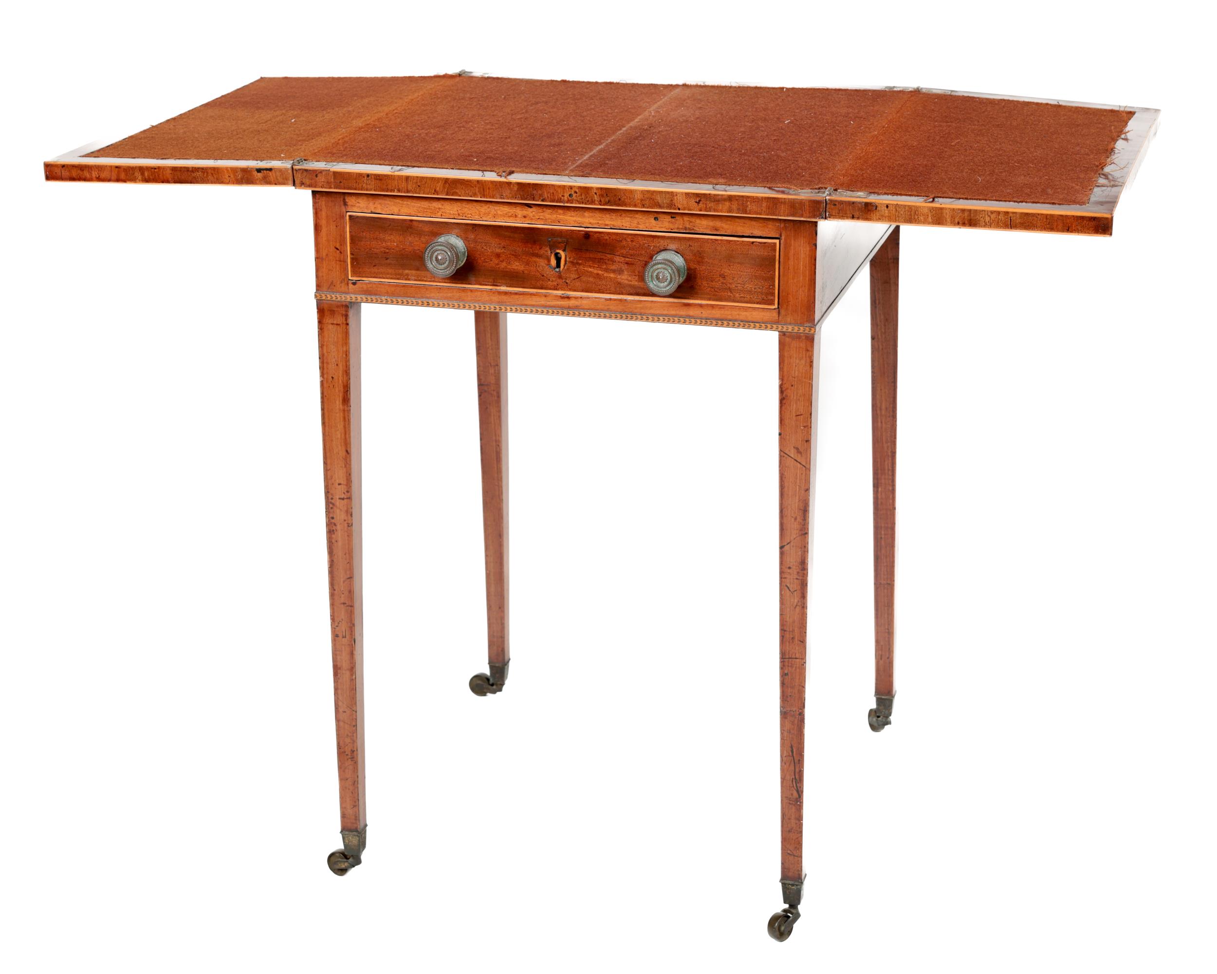 A Regency period mahogany square top fold-out Card Table, the top with satinwood string inlay, above