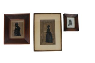 A fine large 19th Century, "Silhouette of a Lady by a Window," signed  and dated 1843, approx. 25.