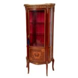 A French Louis XVI style Vitrine, the pierced gallery top over frieze with ormolu mounts, the