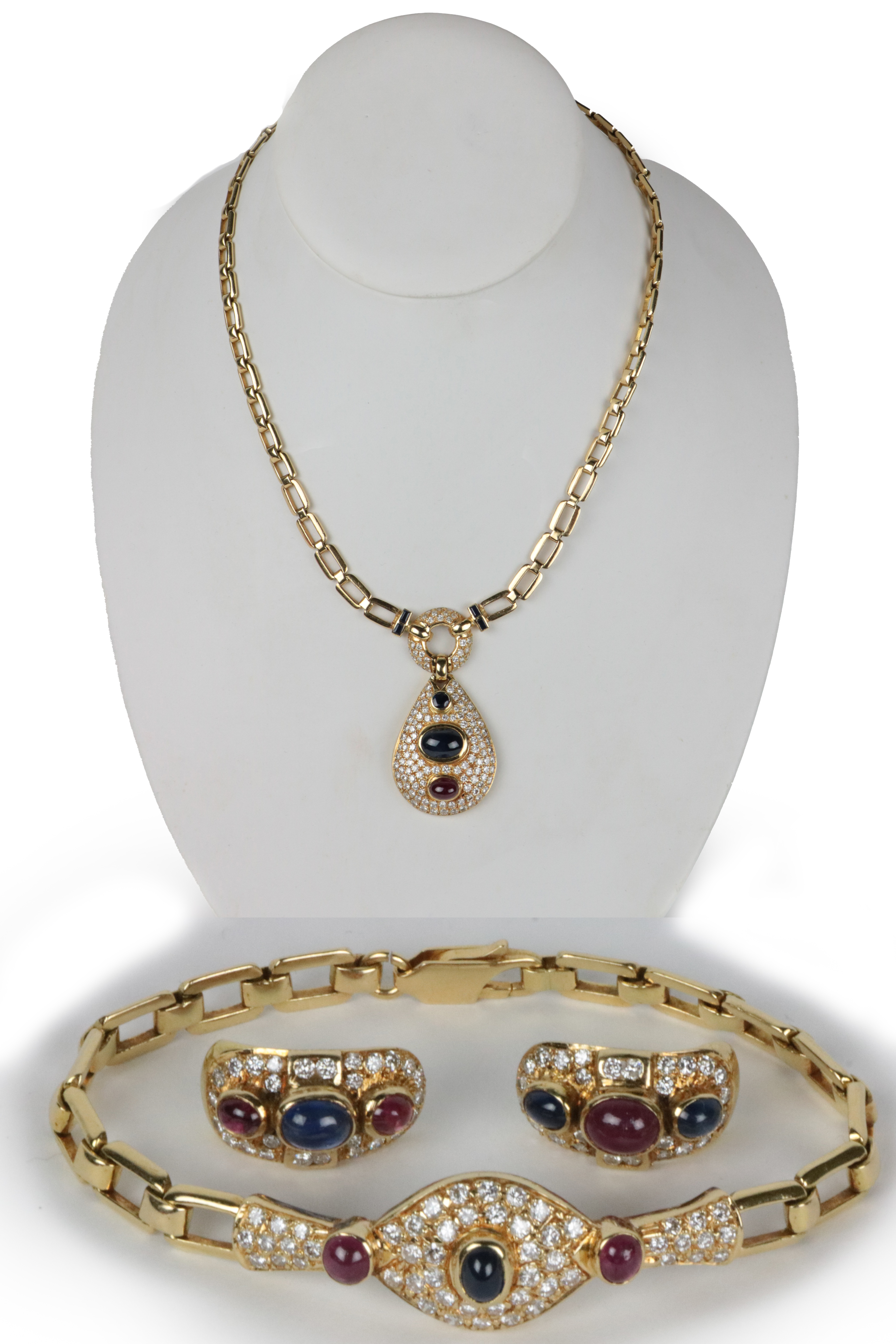 An attractive Ladies Bulgari design Necklace, the 18ct gold link chain issuing an attractive pear