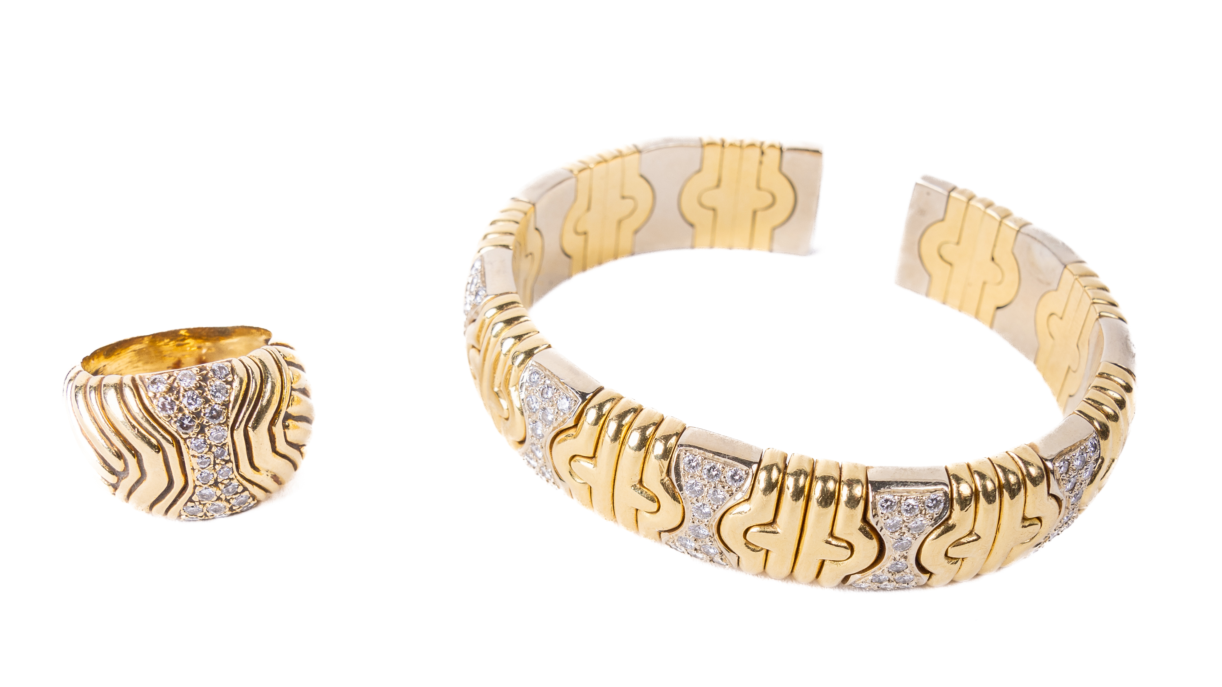 An attractive 18ct lime and yellow gold Bulgari design rigid Bracelet, set with 60 diamonds 1.