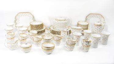 A collection of 'Fleur de Lys' gold pattern design Spode Firebone China, comprising Tea & Coffee