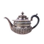 An attractive English silver Teapot, the hinged lid with ebonised finial and leaf decoration over