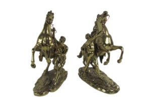 After Guillaume Cousteau (1677-1746) A pair of bronzed metal Marley Horses and attendants, each