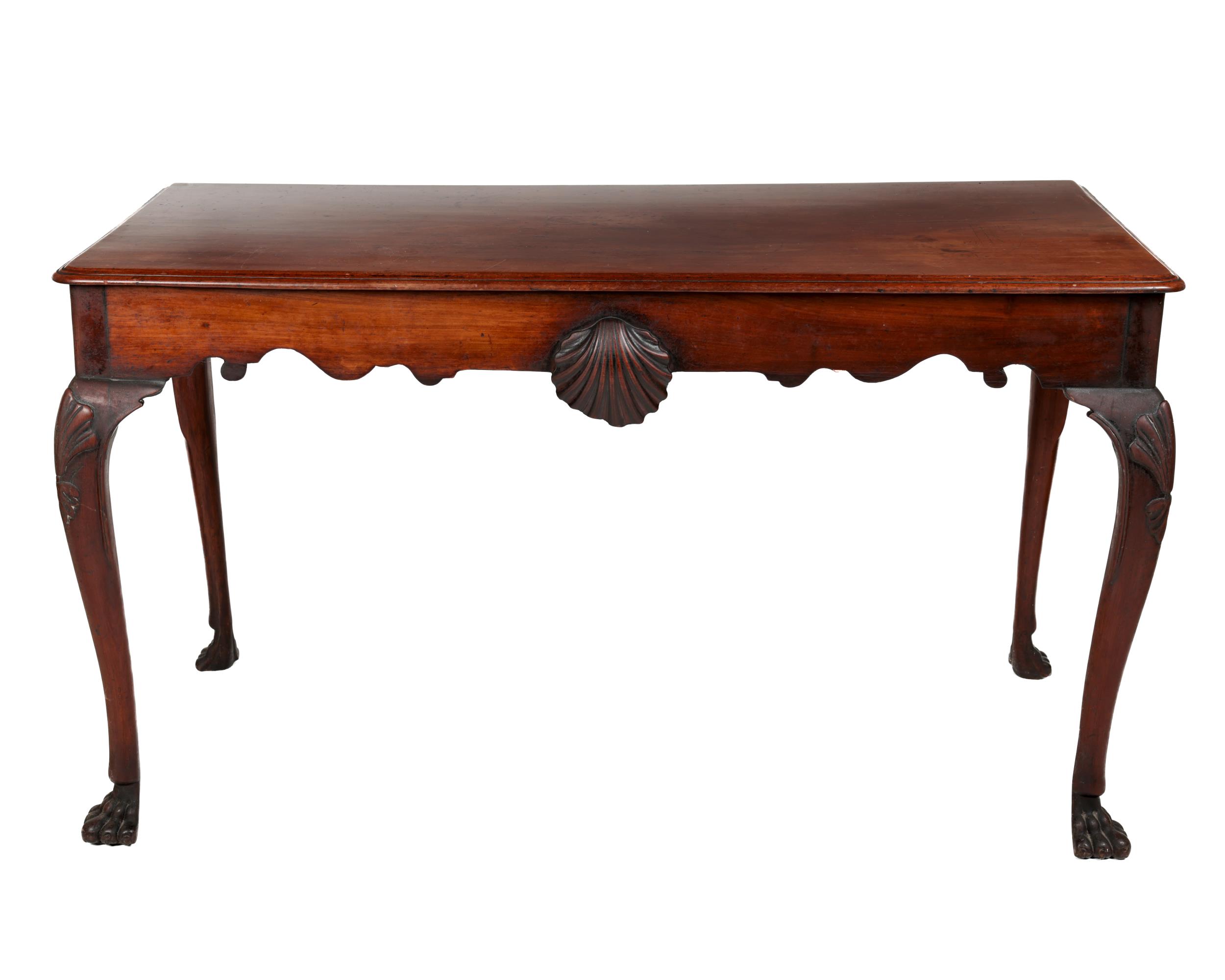A fine quality early 19th Century Irish mahogany Side Table, the plain moulded top over a shaped