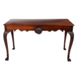 A fine quality early 19th Century Irish mahogany Side Table, the plain moulded top over a shaped