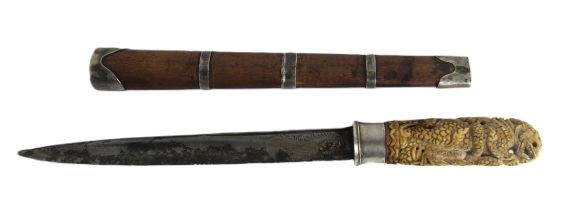 Militaria: A rare 19th Century Burmese Ceremonial Dagger, the hilt depicting a carved bone model