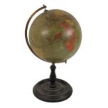 A good late 19th Century 9" Table Globe, by Phillips, London, with brass mounting on turned ebonised