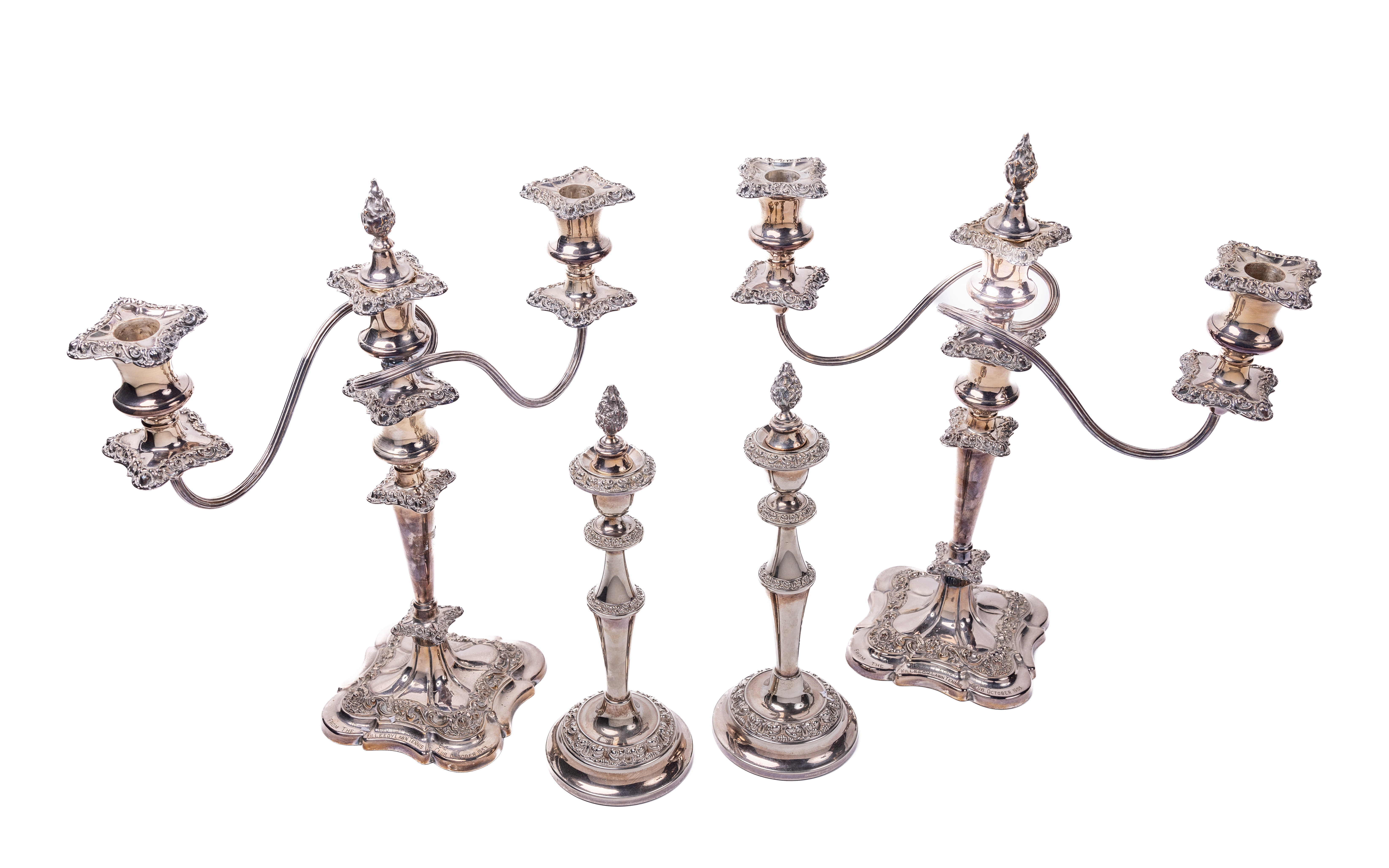 A pair of Victorian silver plated two branch three light Candelabra, of embossed design, with