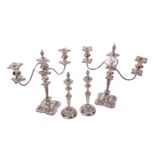 A pair of Victorian silver plated two branch three light Candelabra, of embossed design, with