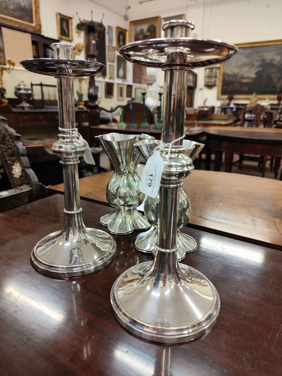 A pair of fine quality silver plated Arts and Crafts pillar Candlesticks, with circular drop tray on - Image 3 of 3