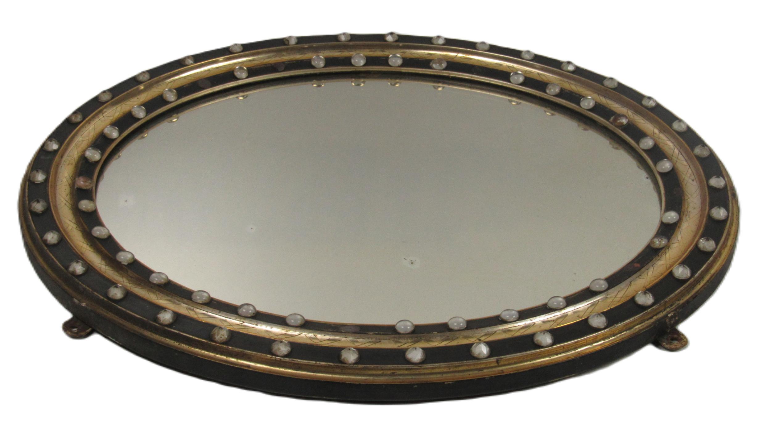 An attractive 19th Century Irish giltwood and ebonised oval Mirror, with silver faceted cut glass