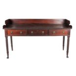 A William IV Nelson type mahogany Serving Table, the gallery back with scroll side over a rope edge,