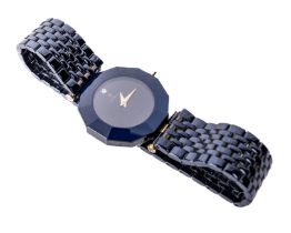 A Ladies stainless steel blue sapphire Wrist Watch, the dial of Dodecagon form, blank face with gilt
