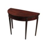 A 19th Century mahogany Sheraton demi-lune fold-over Card Table, the top with slim string inlay over