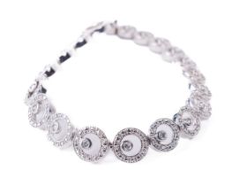 A Ladies 9ct white gold Tennis Bracelet, (15.5grams) set with approx. .4ct of diamonds, hallmarked