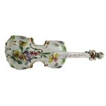 An early 19th Century German porcelain hand painted model of a Cello, decorated with colourful