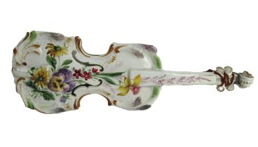 An early 19th Century German porcelain hand painted model of a Cello, decorated with colourful