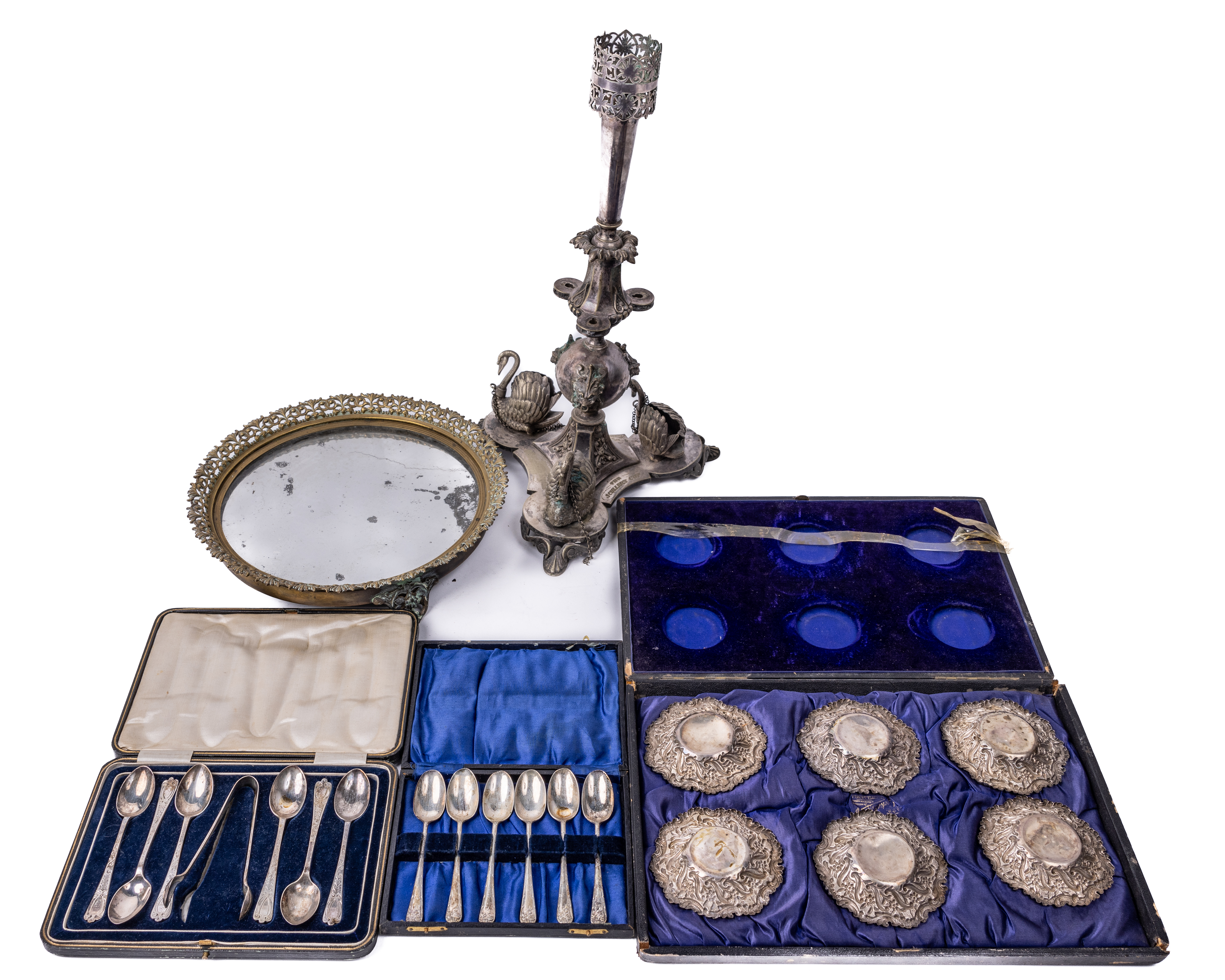 A Victorian silver plated Centerpiece, with grotesque mask mounts and perched swans on a triform